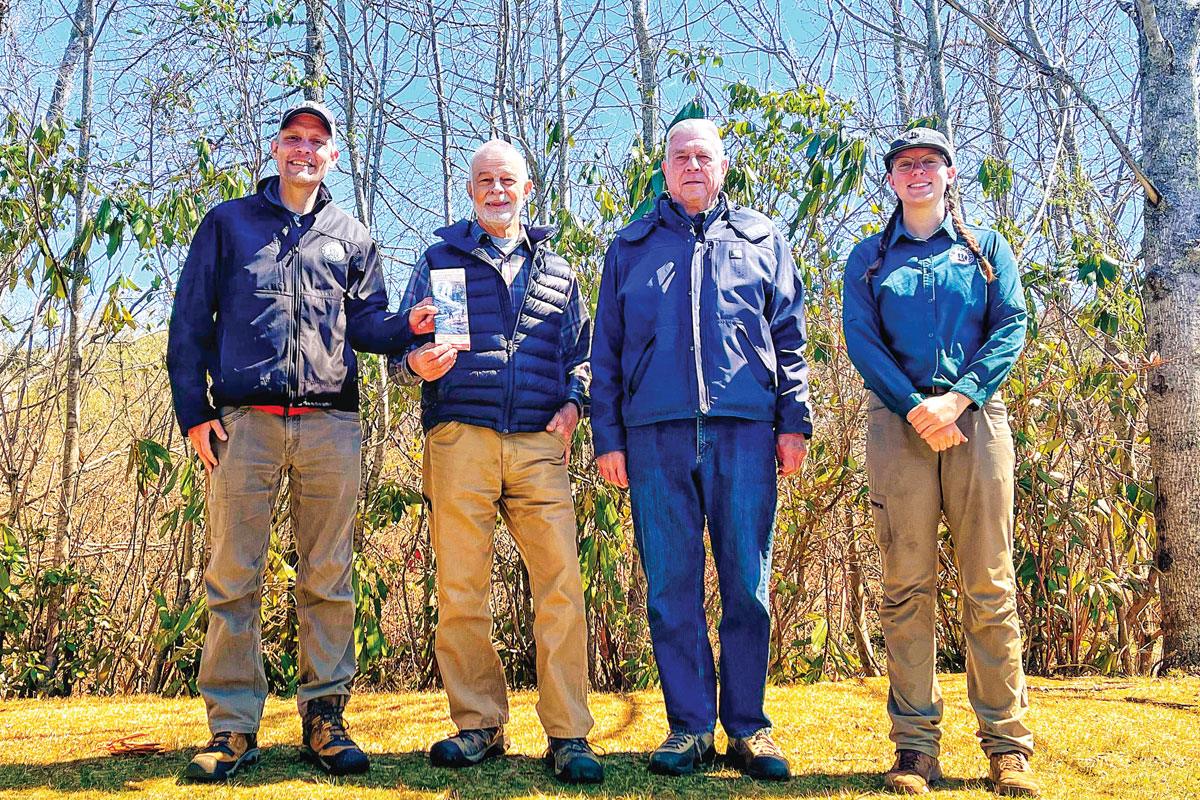 Friends of Panthertown Executive Director, Jason Kimenker, and Trails &amp; Stewardship Director, Kara McMullen, meet with Burt Kornegay and Mike Purdy. Donated photo