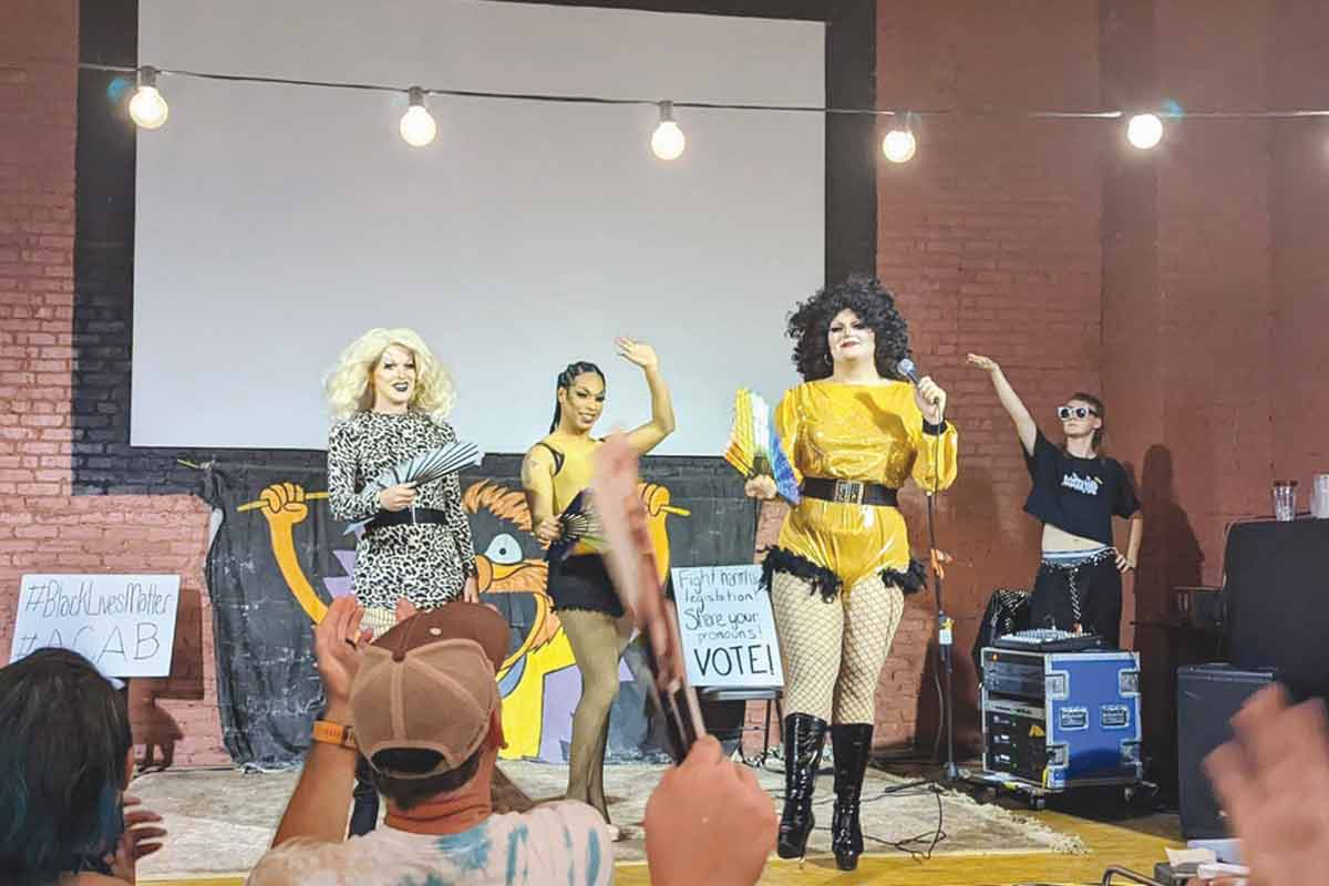 Marigold Showers (left) alongside Alexis Black and Beulah Land on stage at Lazy Hiker. Sylva Belles Drag photo