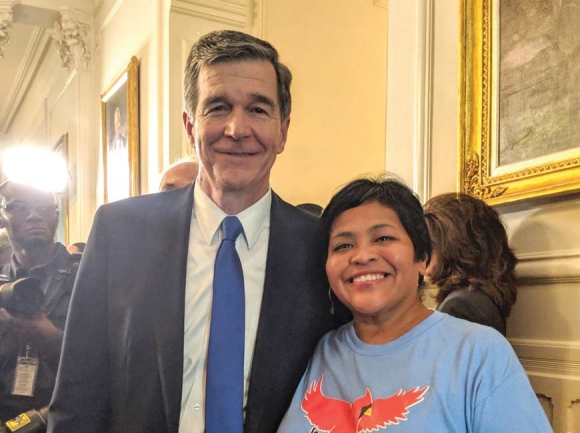 Sylva resident Carrie McBane meets with Gov. Roy Cooper in Raleigh last week as Cooper announced his decision to veto the state budget. Donated photo