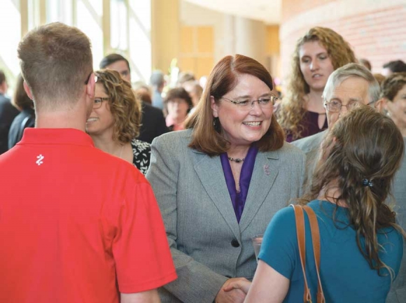 Dr. Kelli Brown shakes hands with WCU students during a reception to welcome the chancellor-elect to the university. WCU photo