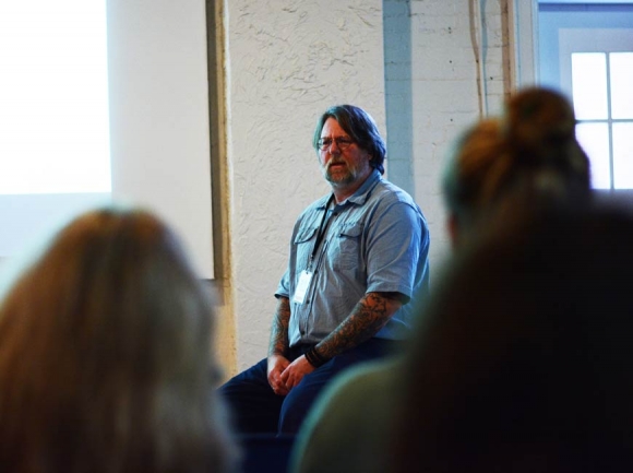 Suicide prevention trainer Bob Cummings speaks to a group of about 25 at Folkmoot Sept. 10. Holly Kays photo