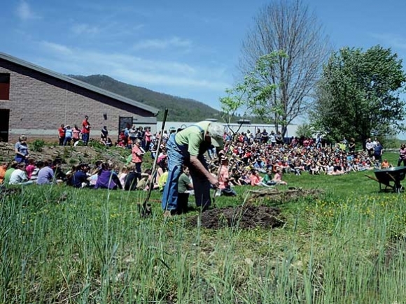 Kids plant trees for the future