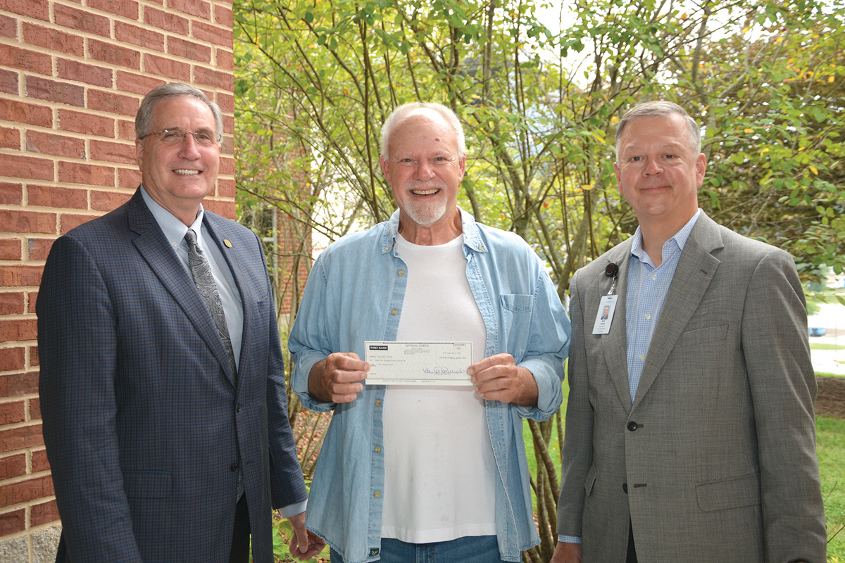 Mike Wade, with SCC President, Don Tomas, left, and SCC Foundation Director Brett Woods, right, recently created a new $500,000 endowed fund with the Southwestern Community College Foundation. When complete, it will be the single largest cash commitment in SCC history. Donated photo