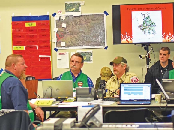 The green team strategizes in the command room. Holly Kays photo
