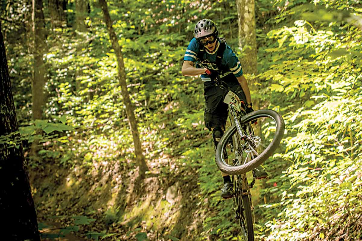 A mountain biker performs a midair trick at Fire Mountain. EBCI photo  