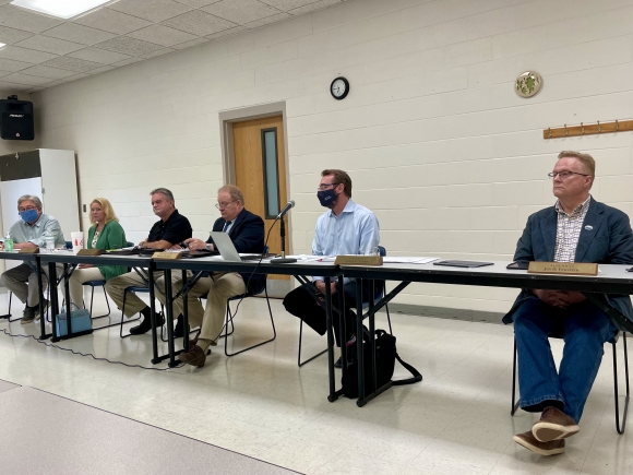 The Town of Waynesville Board of Aldermen listens to comment from DWA board members on Aug. 12. 