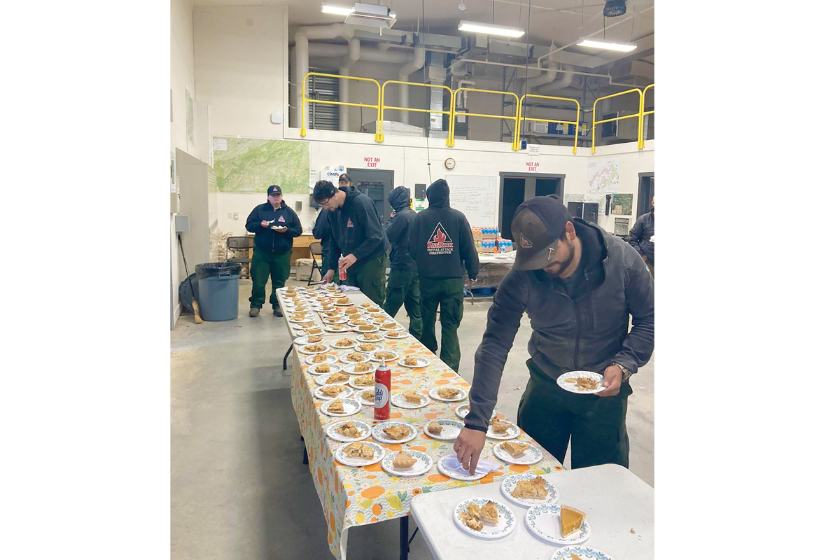 Working through Thanksgiving, firefighters battling the Black Bear Fire  eat their holiday meal on the job. U.S. Forest Service photo