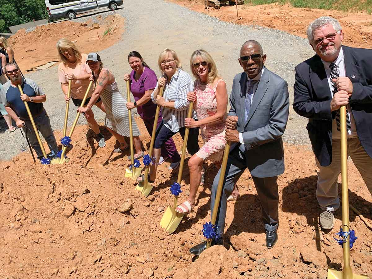 Several people were unhand for a groundbreaking at Mountain Projects&#039; Harris Estates, a self-help project that will feature five new homes for first-time homeowners. 