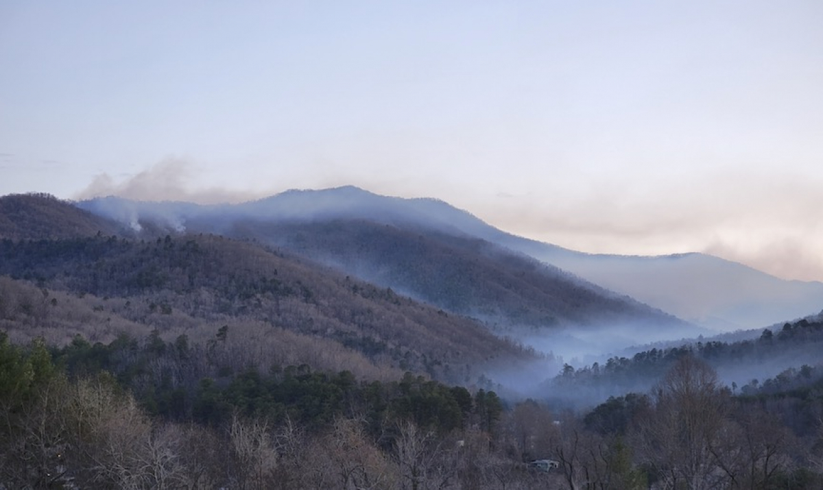 The Thomas Divide Complex Fire smolders in the early morning. NPS photo