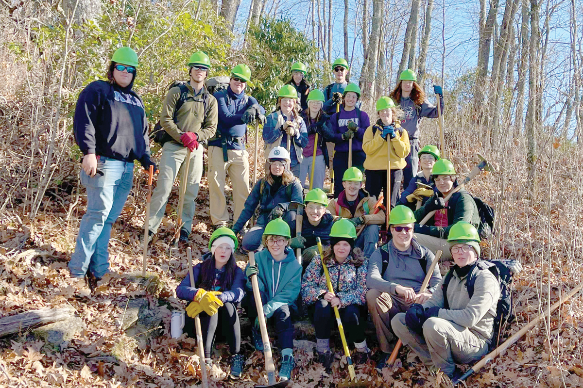 Volunteers pose for a photo after a day on the trail. Friends of Panthertown photo