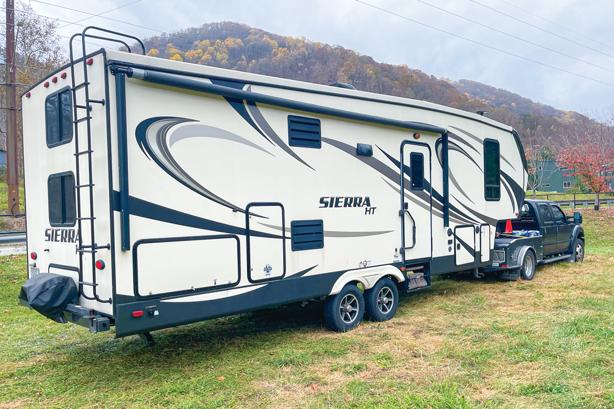 This truck, owned by Iowa resident Lavon Schwartz, pulled a fifth-wheel camper all the way from Chicago to Western North Carolina to be used by a family whose house was rendered uninhabitable by the flood. Kyle Perrotti photo