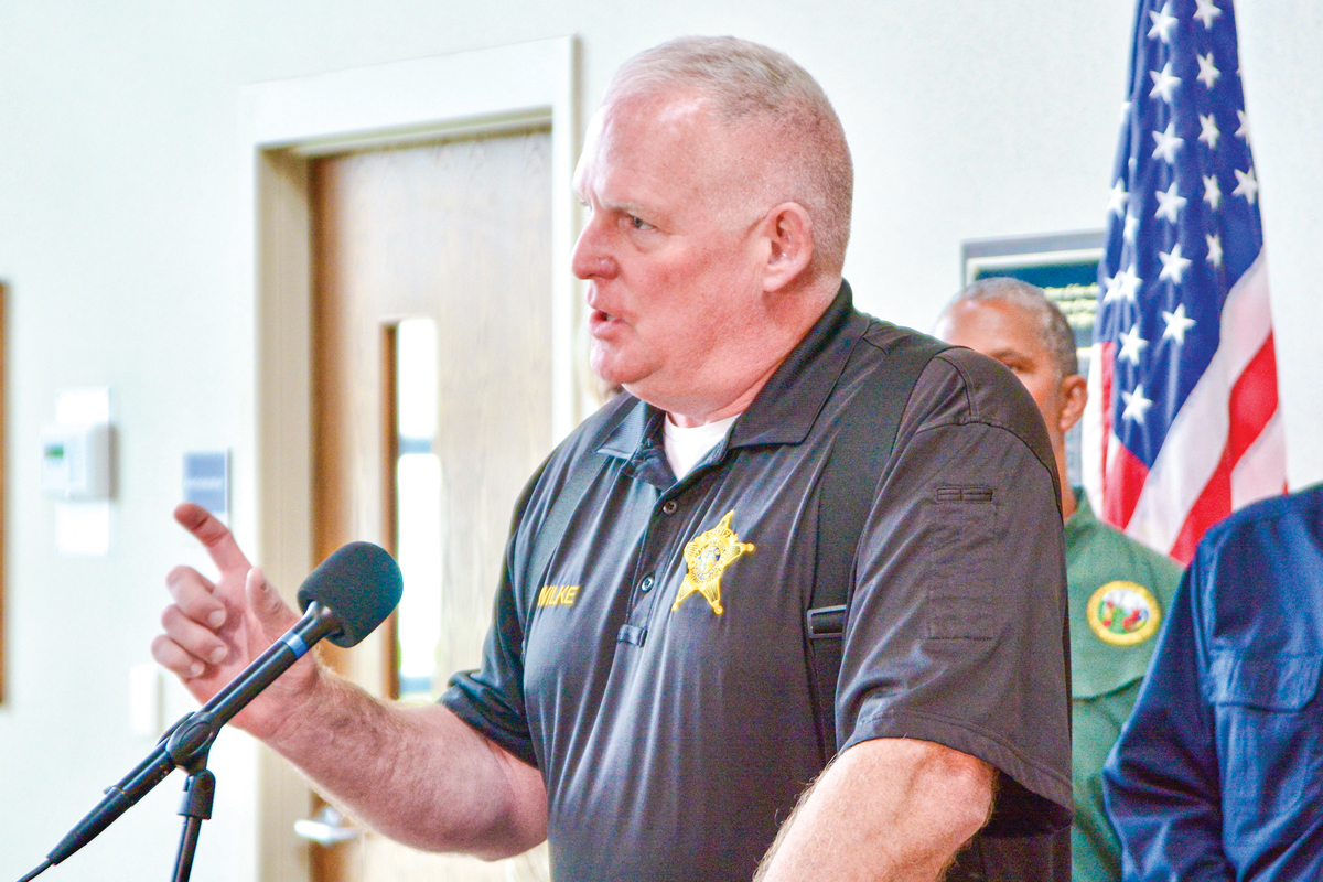 “Get off Facebook, and get out there and put on a pair of boots and pair of gloves and get to work. And make it count.” — Haywood County Sheriff Bill Wilke speaks at an Oct. 4 press conference. Cory Vaillancourt photo