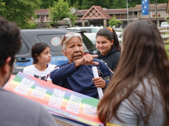 Yellowhill community member Mary Crowe speaks with LGBTQ advocates outside the Cherokee Council House July 8, following Tribal Council’s second refusal to consider an ordinance legalizing same-sex marriage. Holly Kays photo