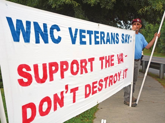 Bob Houde of the Carolina Veterans Peace Coalition was among the first to show up at an appearance in Waynesville by Rep. Mark Meadows Aug. 10. Cory Vaillancourt photo