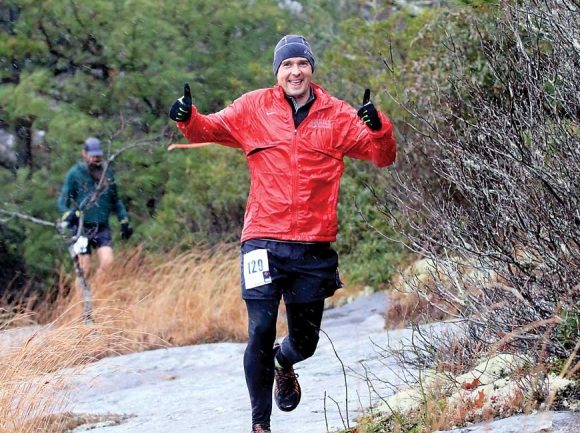A runner gives a thumbs-up in the middle of a frosty run. April Copeland photo