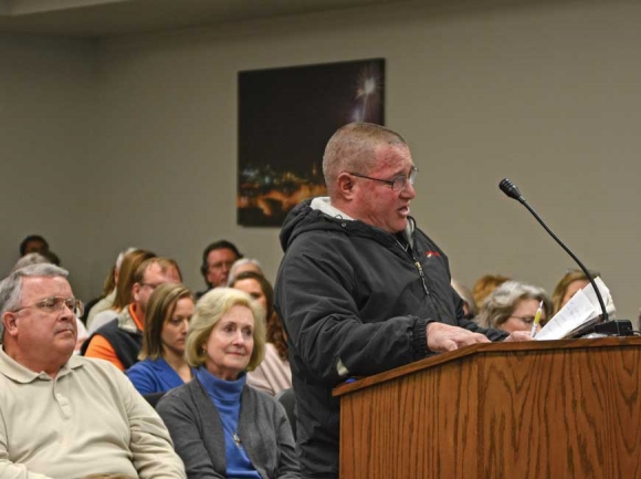 David Allen, owner of A1 Marine in Glenville, tells commissioners why he believes the no wake zone issue should be dropped. Holly Kays photo