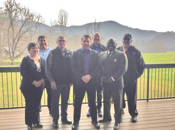 Great Smoky Mountains National Park Superintendent Cassius Cash stands with members of tribal government. Pictured are (from left) Councilmember Lisa Taylor, Councilmember Bucky Brown, Councilmember Richard French, Principal Chief Richard Sneed, Councilmember Tom Wahnetah, Cash and Councilmember Perry Shell. NPS photo 