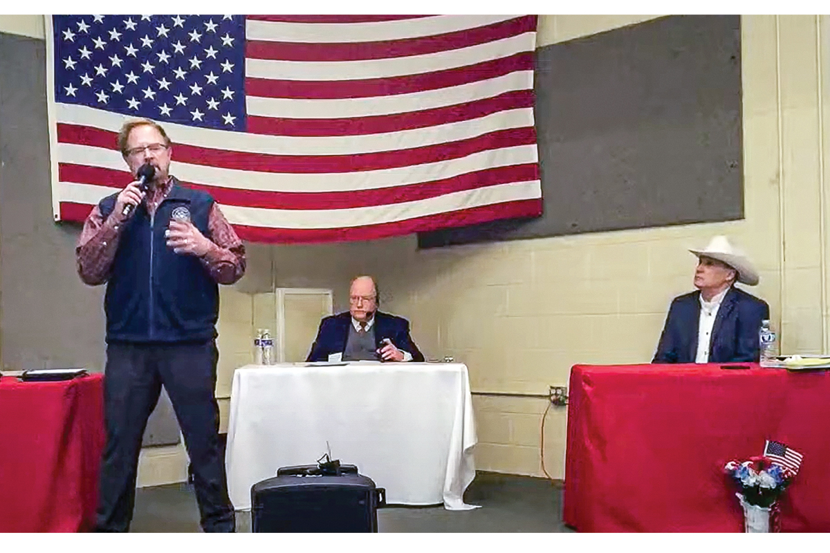 Rep. Chuck Edwards (left to right), moderator Larry J. Ford and challenger Christian Reagan hold a Republican Congressional Primary Debate on Jan. 13 in Brasstown. Clay County Republican Party/Larry J. Ford screenshot