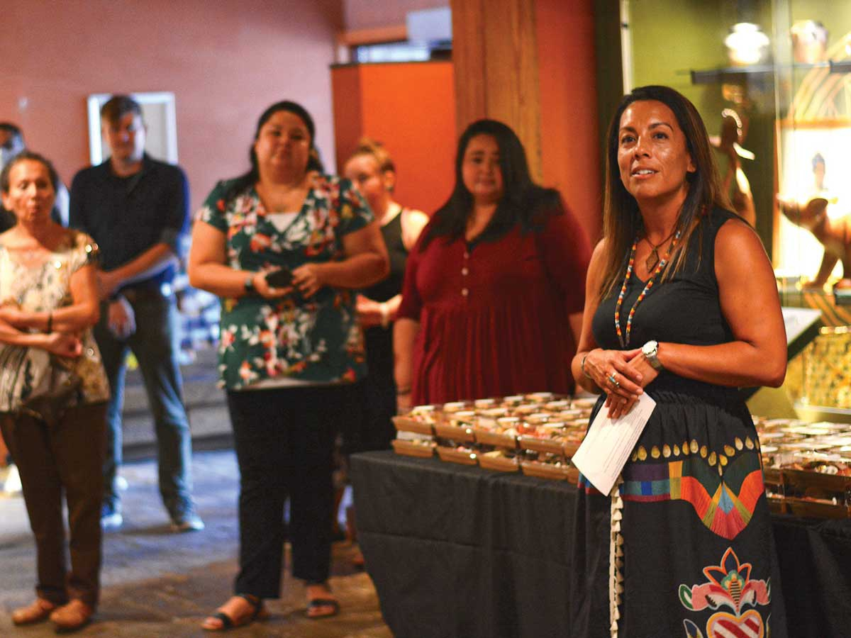 Museum Director Shana Bushyhead Condill addressed the community leaders and artists gathered for the opening of “Disruption” Sept. 7. Holly Kays photo