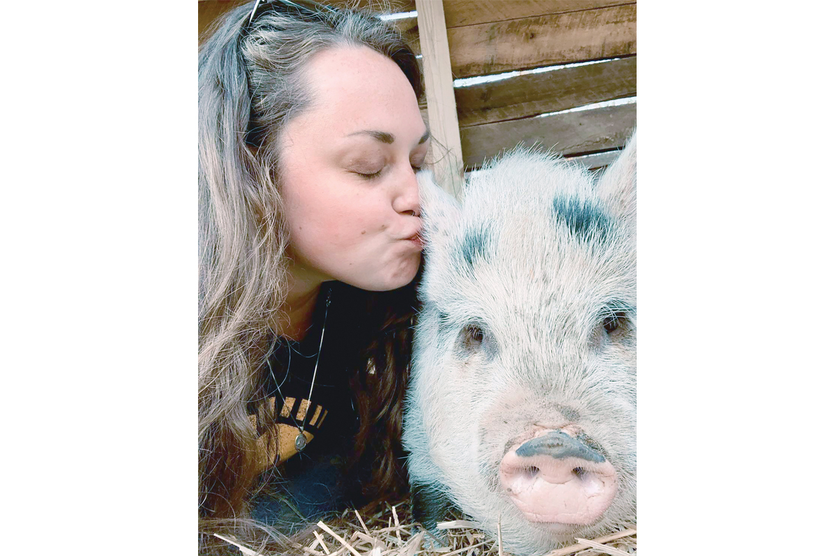 Amy McIntosh snuggles one of Misfit Mountain’s furry residents. Donated photo