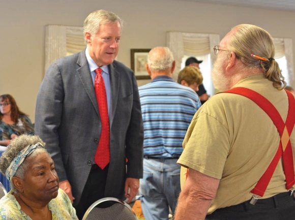 N.C. 11th District Congressman Mark Meadows (center) talks with veterans at the Haywood County Senior Resource Center this past August. Cory Vaillancourt photo