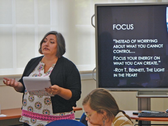 Amy Murphy-Nugen (left), chair of Waynesville’s Task Force on Homelessness, presents the group’s findings on July 8. Cory Vaillancourt photo