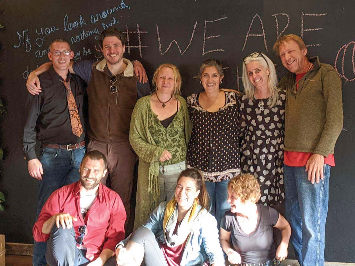 The staff of Seek Healing settles into the new office on Depot Street in Waynesville. Donated photo