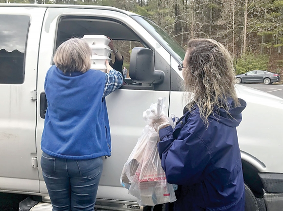 Workers at Junaluska Elementary school had handed out more than 160 to-go meals for students by 1 p.m. on March 17. Cory Vaillancourt photo