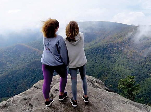 The girls get a look at the Southern Nantahala Wilderness from Pickens Nose. Don Hendershot photo