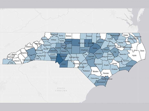 Darker counties represent more coronavirus cases. Counties in white have no reported cases. Data is as of 2 p.m. on March 31, 2020. NCDHHS map