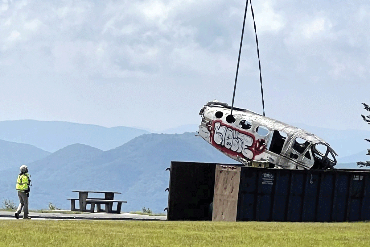 Crash debris is removed via helicopter Tuesday, June 27, near Waterrock Knob on the Blue Ridge Parkway. NPS photo