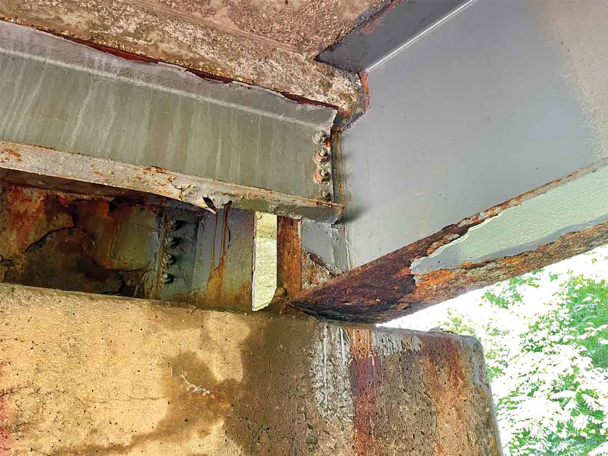 Girders supporting this bridge over Richland Creek, photographed in June, 2021, show significant rust and peeling paint. Cory Vaillancourt photo