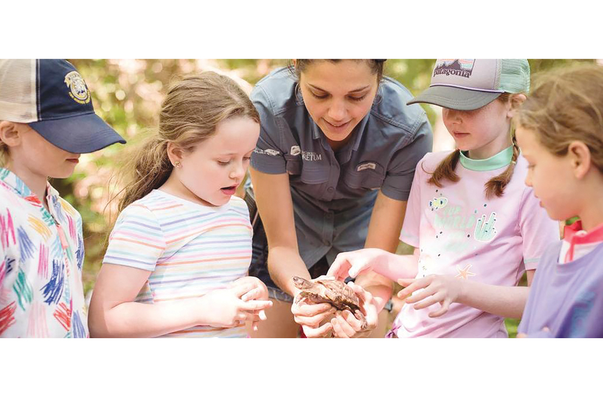 Kids meet one of the wild inhabitants of the N.C. Arboretum grounds. N.C. Arboretum photo