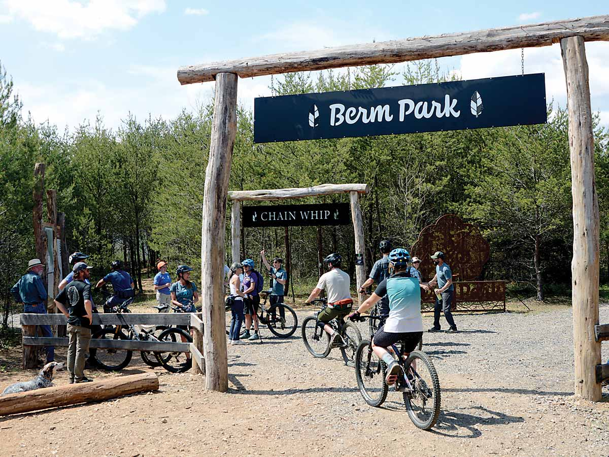 Bikers enter Berm Park in Chestnut Mountain Nature Park shortly after the ribbon-cutting April 22. Holly Kays photo