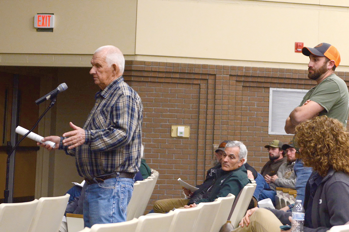 Hunters wait their turn to offer their comments. Holly Kays photo