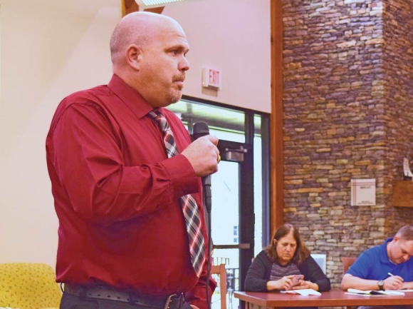Eric Giles, a candidate for Macon County sheriff and a deputy for Cherokee County Sheriff’s Office, speaks at a candidate forum held in April. File photo