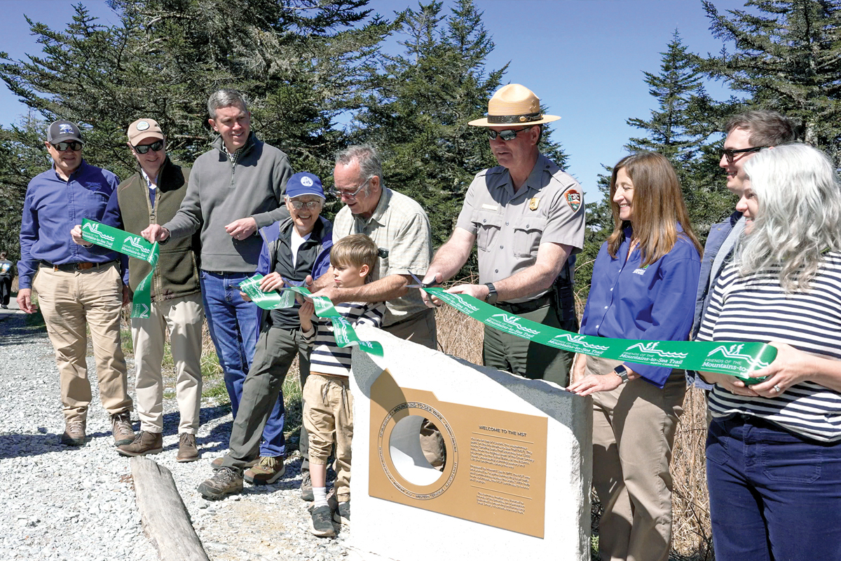 The ribbon was cut on the new trail m arker last week. 