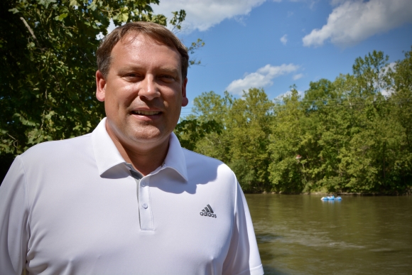 Swain County native and former NC11 Congressman Heath Shuler stands near the French Broad River in Asheville on Tuesday, Aug. 18. 