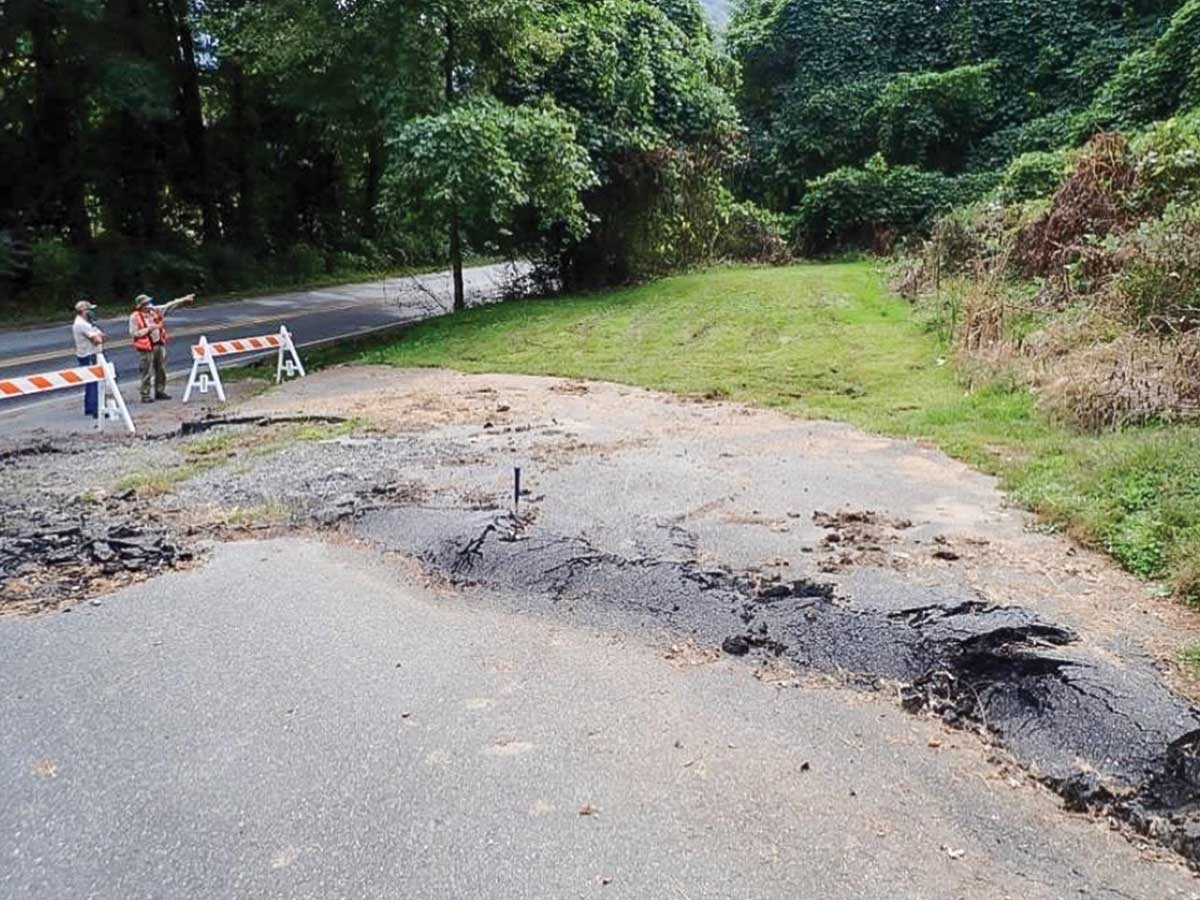 A photo from October 2020 shows the bulge that earth movement from the uphill slope failure has created at the entrance to Bryson Park. NCGS photo