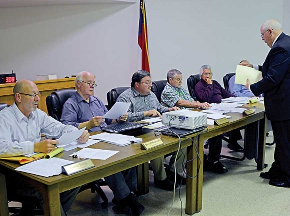 Swain County Board of Elections Chairman John Herrin speaks to commissioners about unpaid retirement benefits for Elections Director Joan Weeks. SMN photo