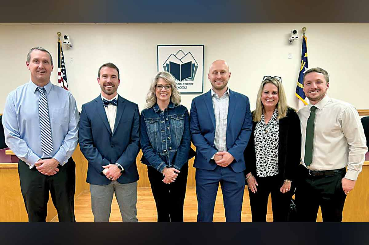Casey Conard (third from right) has been hired as principal at Tuscola High School. HCS photo