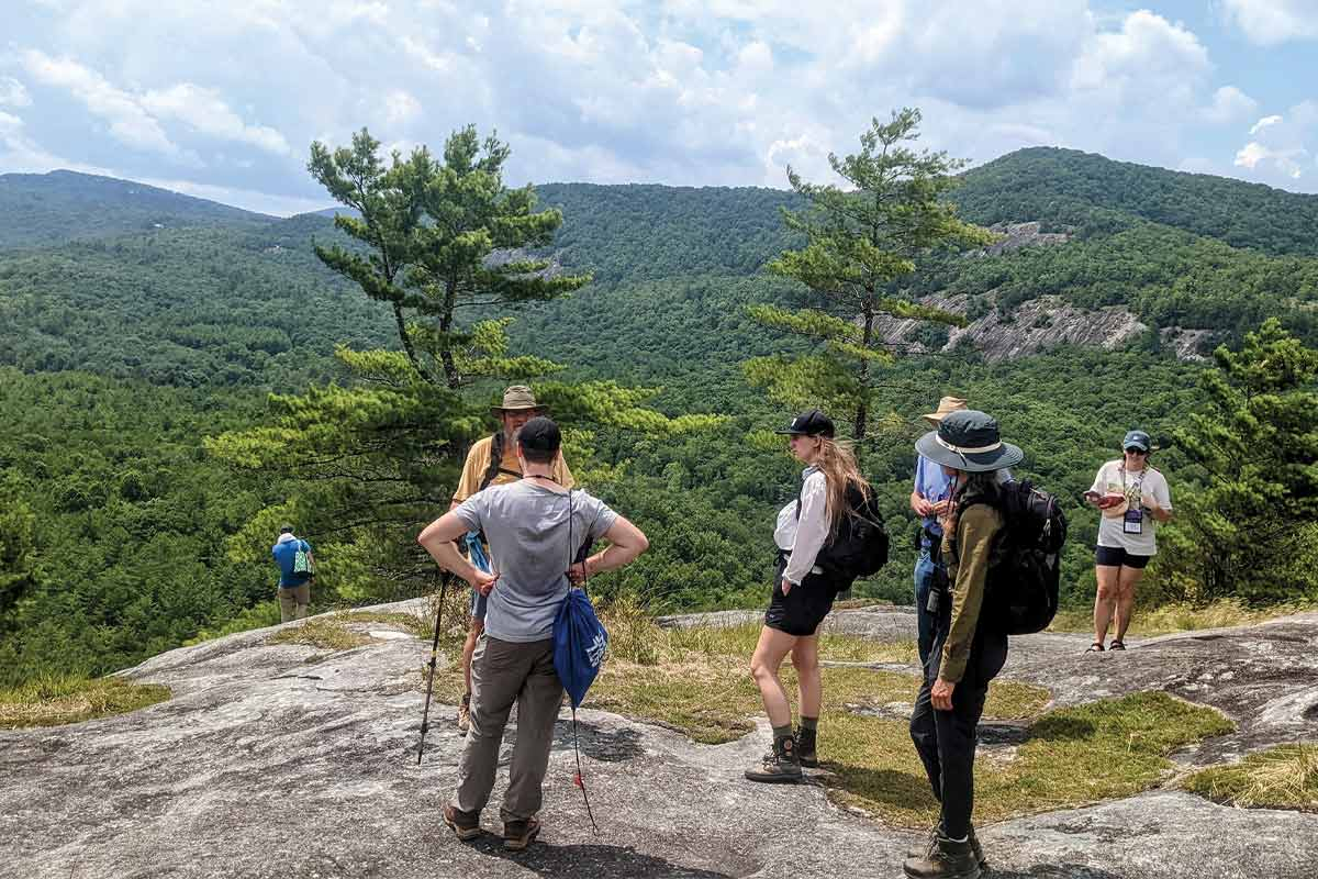 A group from the 2022 Cullowhee Native Plant Conference takes a field trip to Little Green Mountain in Panthertown Valley. Adam Bigelow photo