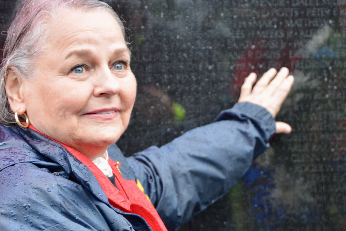 Julia Hall Coffey, widow of recently identified MIA Capt. Fred Hall, locates his name on the Vietnam Veterans memorial for the very first time.  Cory Vaillancourt photo