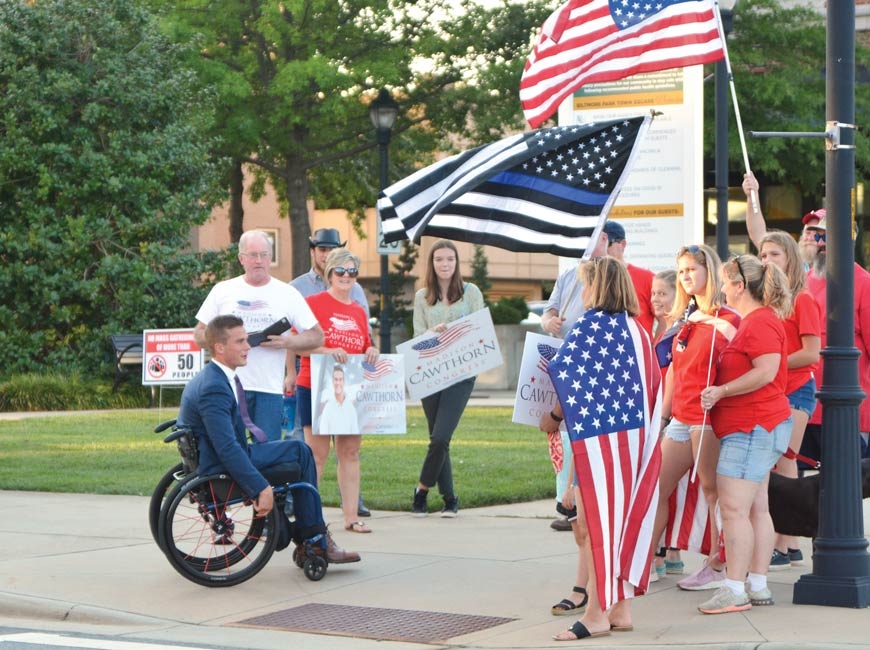 Madison Cawthorn addresses crowd of supporters in Biltmore Park in Asheville. 