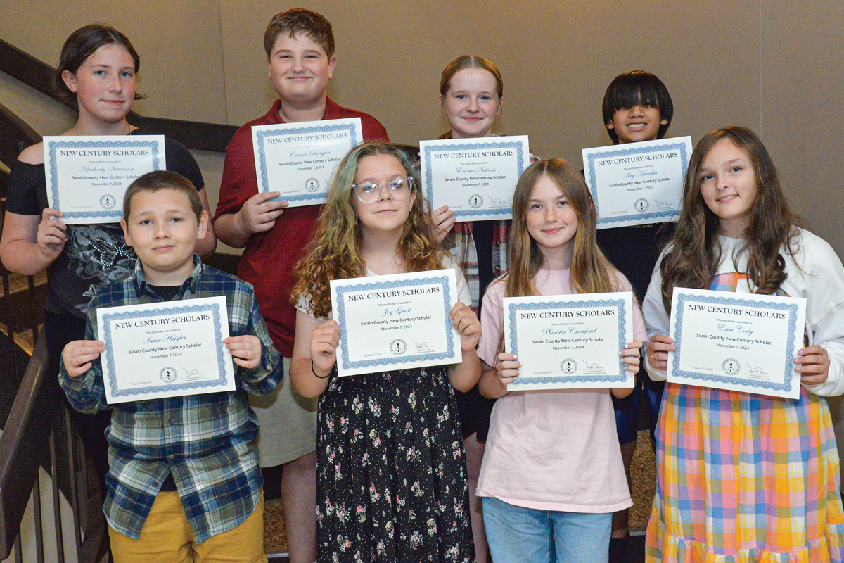 Swain County seventh graders who were inducted into the New Century Scholars program on Nov. 8 at Southwestern Community College, are front row, from left: Isaac Haigler, Joy Guest, Phoenix Crawford and Erin Cody. Back row: Kimberly Stevenson, Carson Reagan, Emma Nations and Ary Menaka. Not pictured are Kaylie Green and Axel Wilmot. Donated photo