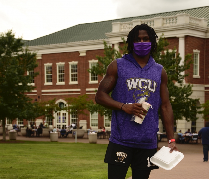 Even outdoors, masks are a frequent sight on the Western Carolina University campus. 