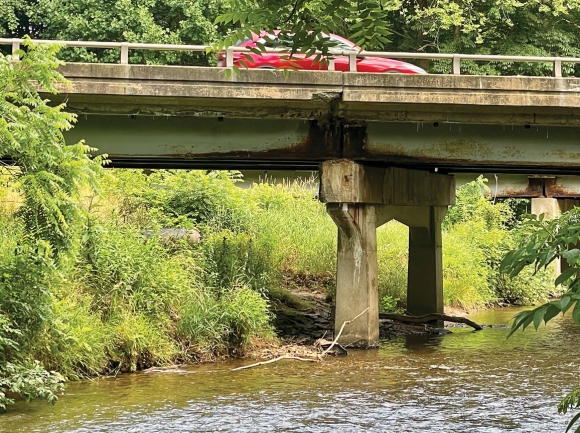 Rusty joints and crumbling concrete are visible on this bridge over Richland Creek in central Haywood County. Cory Vaillancourt photo