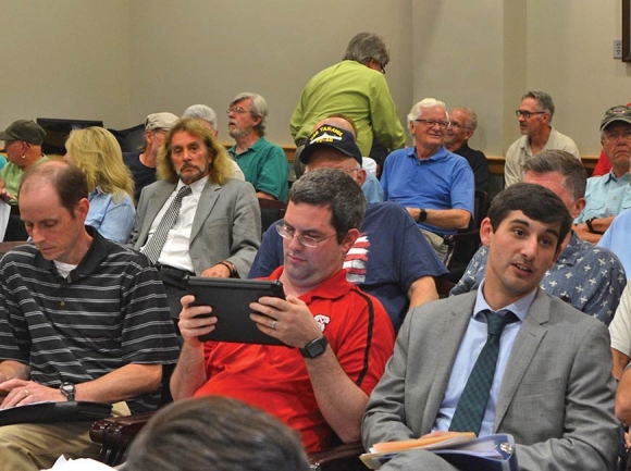 Area residents packed a Waynesville Planning Board meeting last night. 