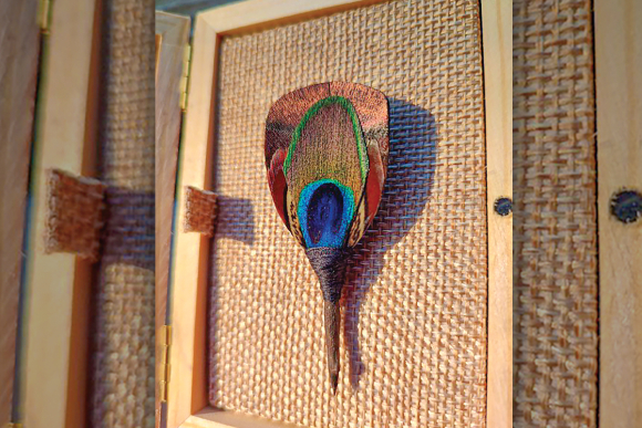 The hat/lapel pin from Brackish.