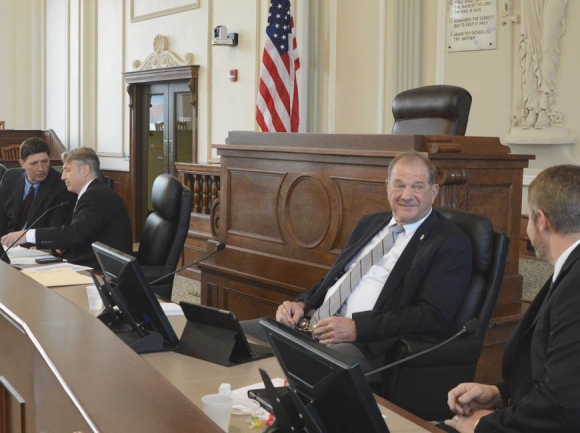 Haywood County Commissioners Kevin Ensley (left to right), Kirk Kirkpatrick, Bill Upton and Brandon Rogers chat before a meeting on Feb. 20, 2017. Cory Vaillancourt photo